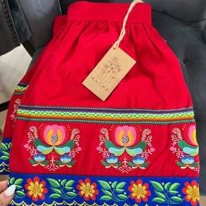 Hand made skirts , from Peruvian culture .